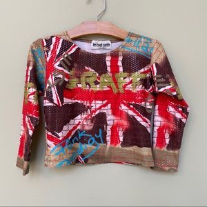 Les Tout Petits by Lois Letzt  graphic top